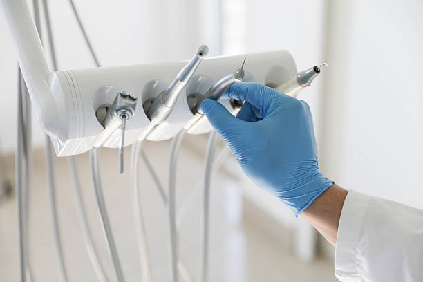 Professional Invisalign Clear Aligners technician working in Hart, MI